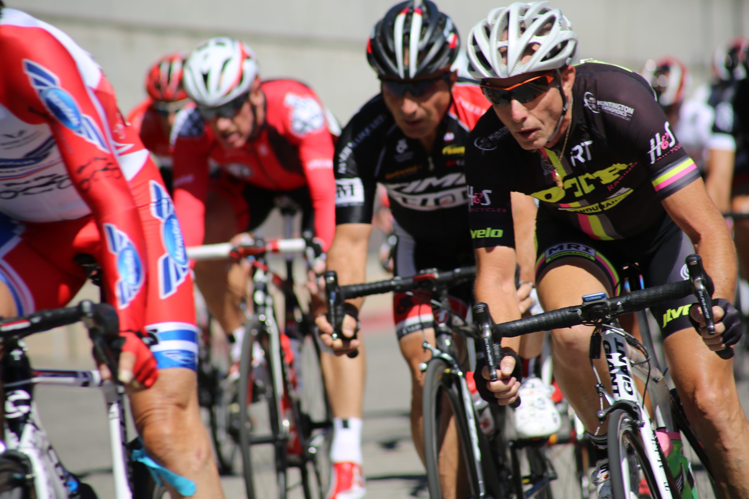Group of male bicycle riders